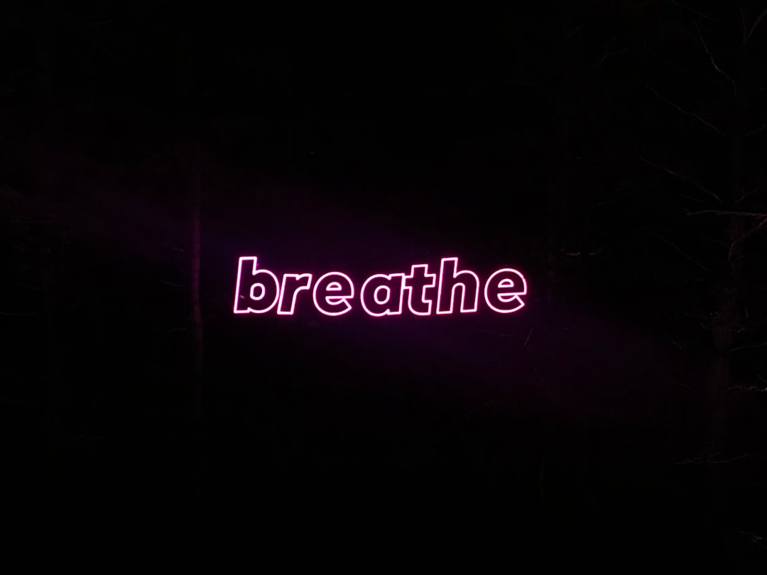 Person practicing breathwork techniques for stress relief